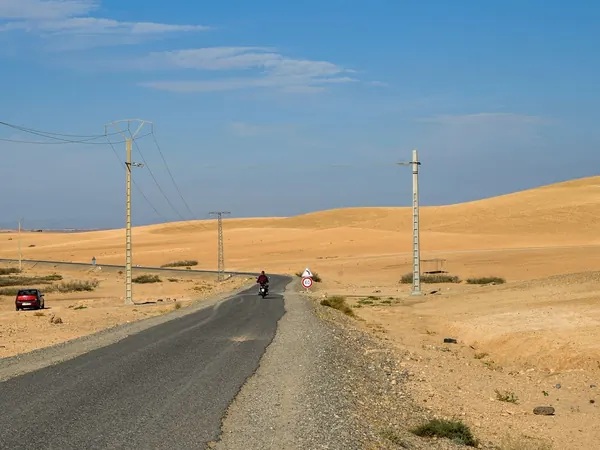 Desert road through the dunes of southern Morocco