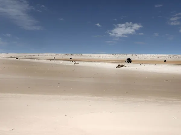 Flat Saharan desert along the N1 south of Dakhla