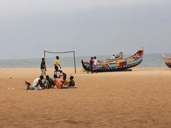 Painted pirogues on the beach in Togo