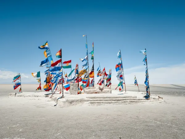 Colchani, flags at the entrance to the Salar de Uyuni