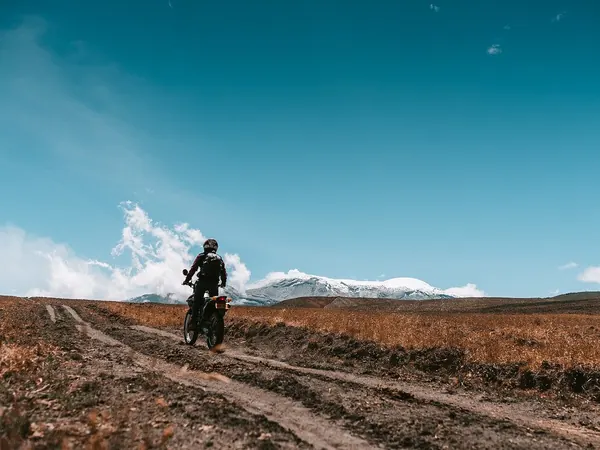 Riding the pรกramo road below Nevado del Ruiz, Los Nevados