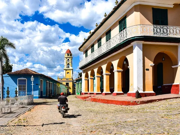 Trinidad, cobblestone street and San Francisco bell tower