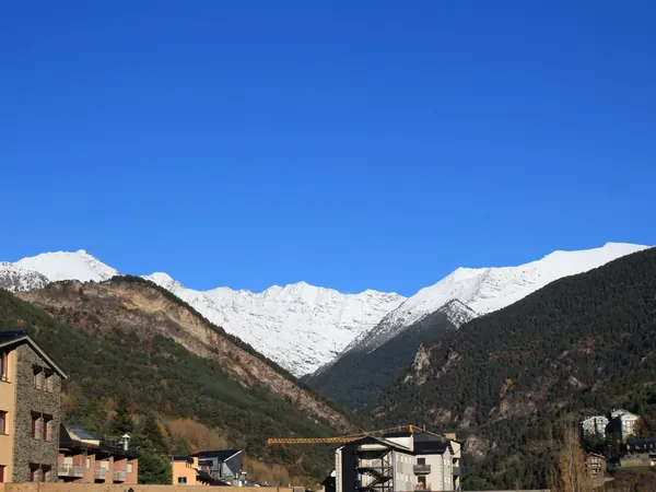 Andorra, valley town below snow-capped peaks (La Massana)