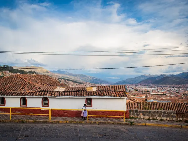 Cusco rooftops and surrounding mountains