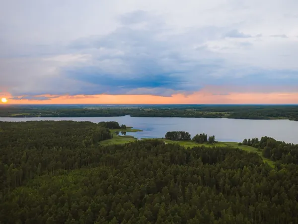 Forest lakes of Tver Oblast at sunset (Lake Derbovezh region)