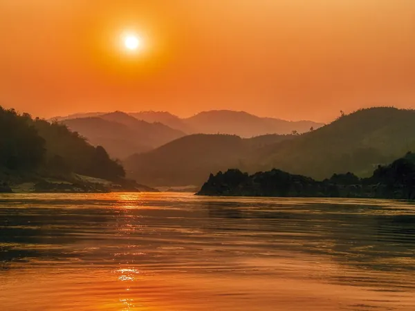 Sunset over the Mekong in the hills of northern Laos (Bokeo, upstream of Pak Beng)