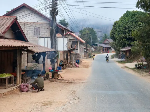 Village road through the hills of northern Laos