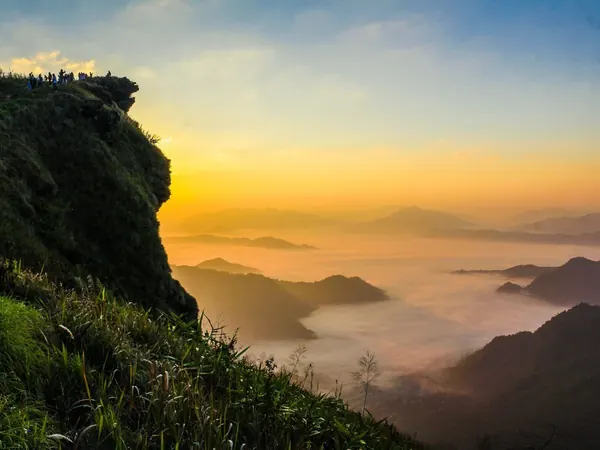 Phu Chi Fa cliff and sea of clouds at sunrise