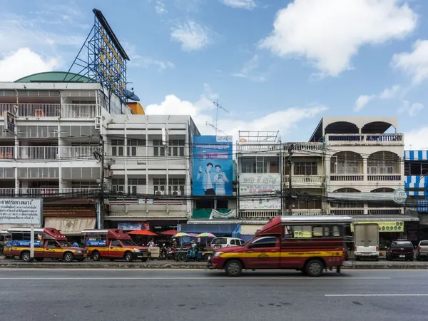 Chiang Rai, city street with songthaews