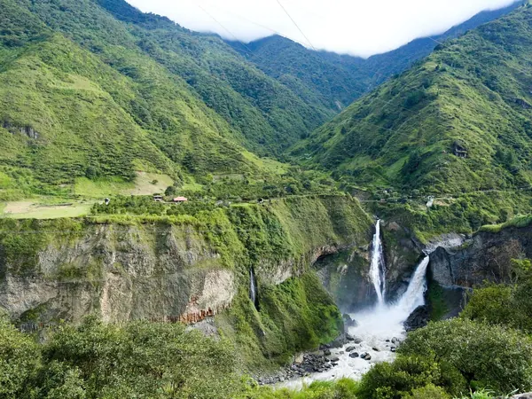 Waterfall in the green Pastaza valley near Baรฑos