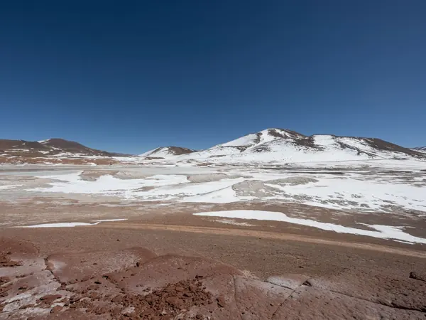 Snow and high desert in the Andes of the Antofagasta region, on the remote border crossing into Chile