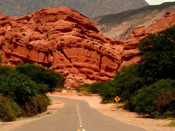 Road through the red rock of the Quebrada de las Conchas
