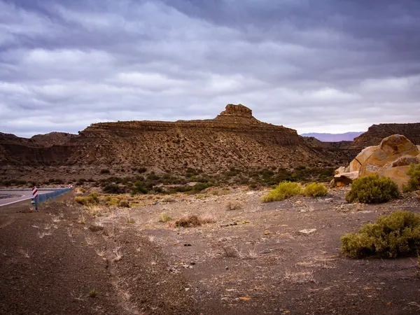Empty road through the desert pre-cordillera of San Juan